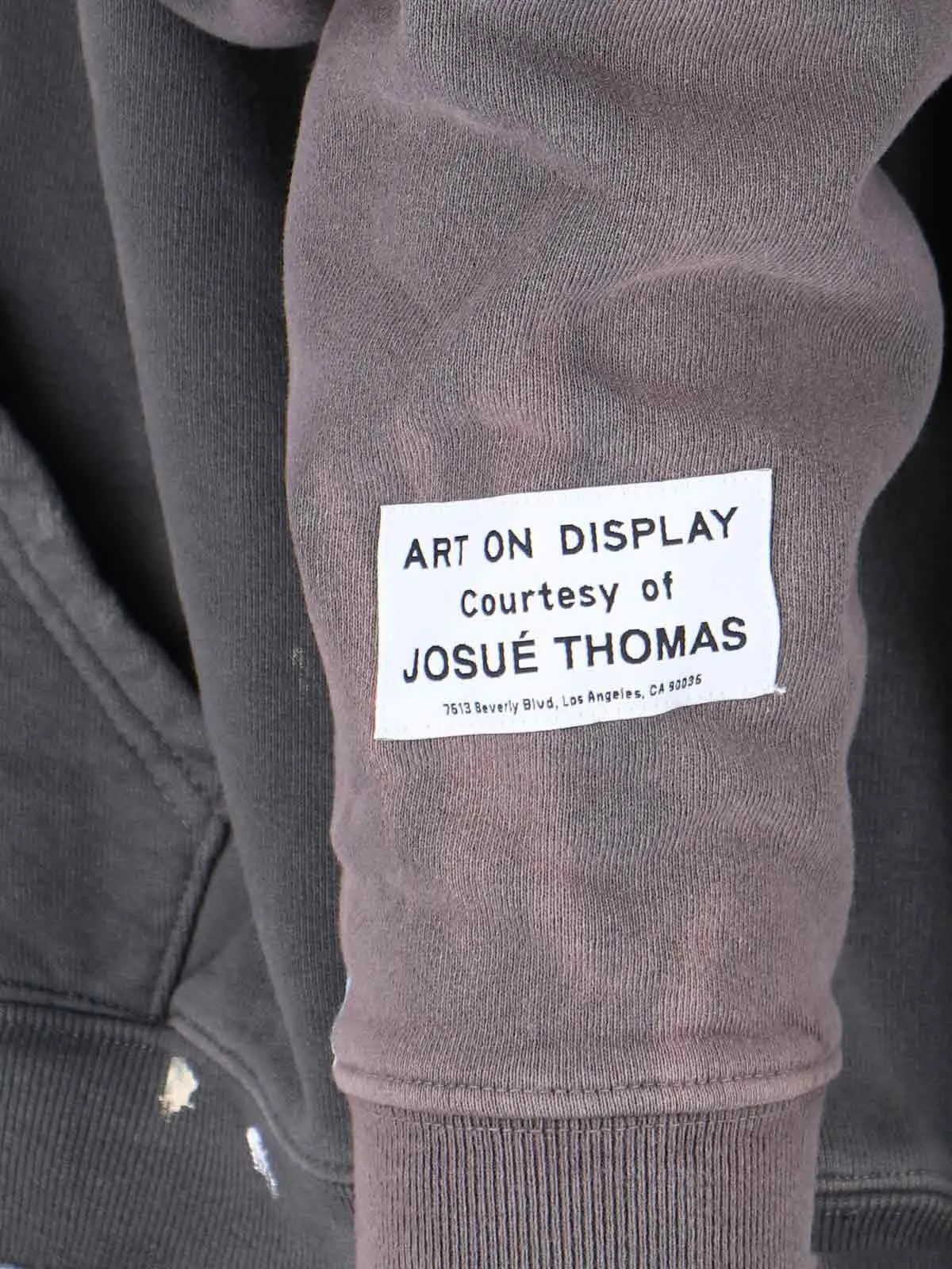 GALLERY DEPT. 90'S RECYCLE HOODIE WASHED BLACK 90'S washed hoodie with distressed eco-friendly slogans. Washed black S-XL. Ready-made garments are washed and dyed again. Multiple spots throughout the body are spray-faded. The ribs are cut and worn.